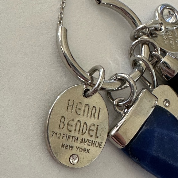 Henri Bendel  silver tone necklace with dark blue crystal and logo charms disc - Picture 8 of 9